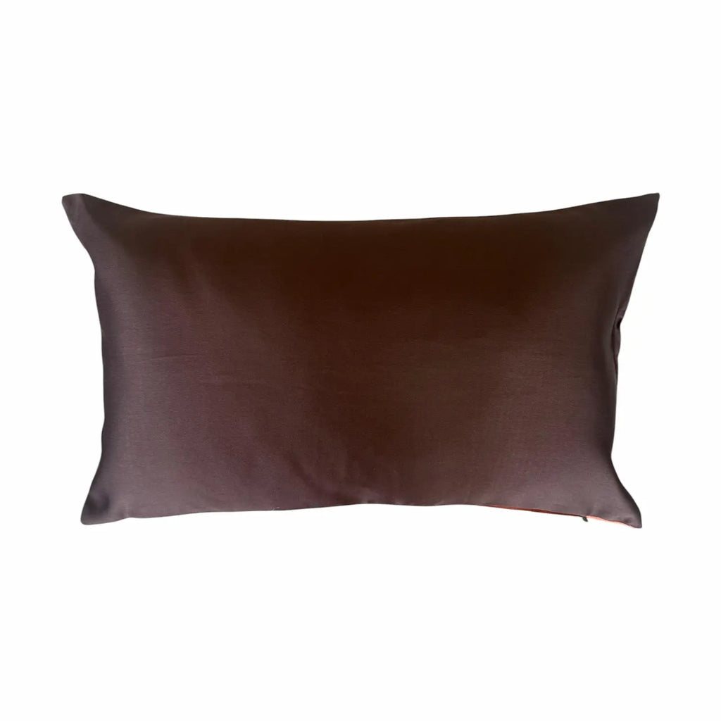 Brown satin cushion on a white background
