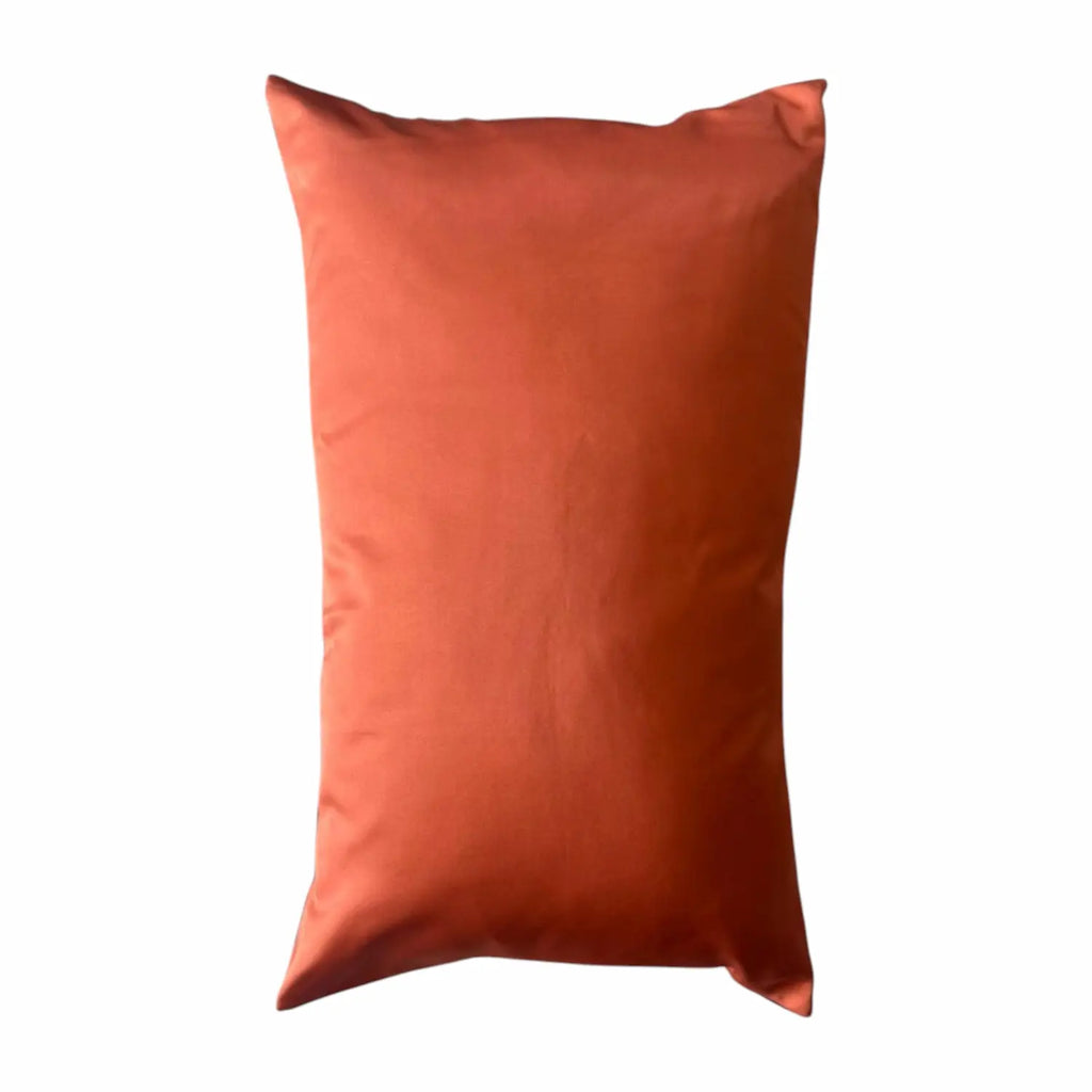 Orange cushion on a white background