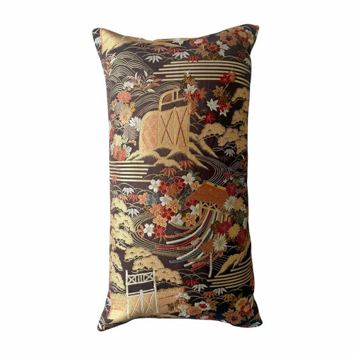Decorative cushion with intricate patterns on a white background