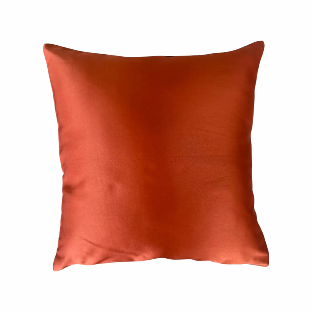 Orange cushion on a white background