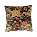 Decorative cushion with intricate floral design on a black background