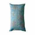 Decorative cushion with floral and bird pattern on a white background