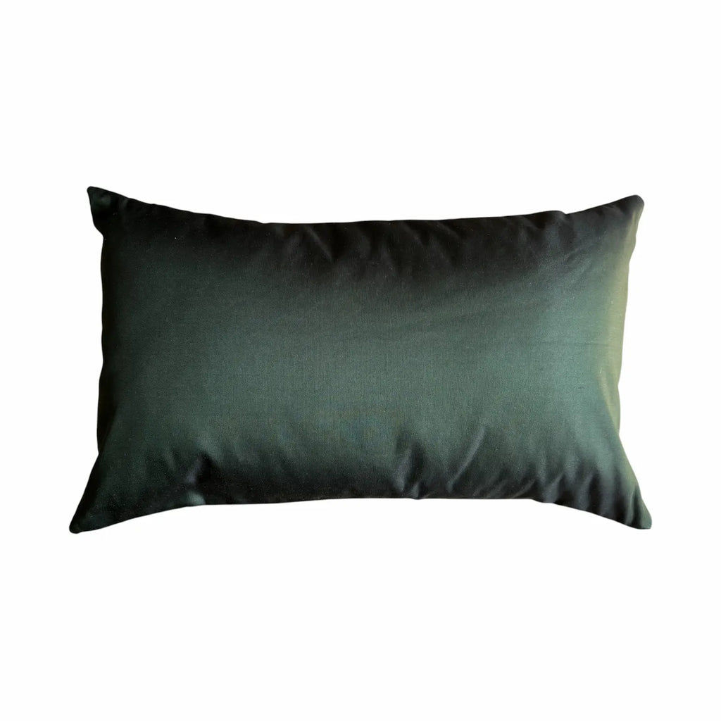 Dark green cushion on a white background