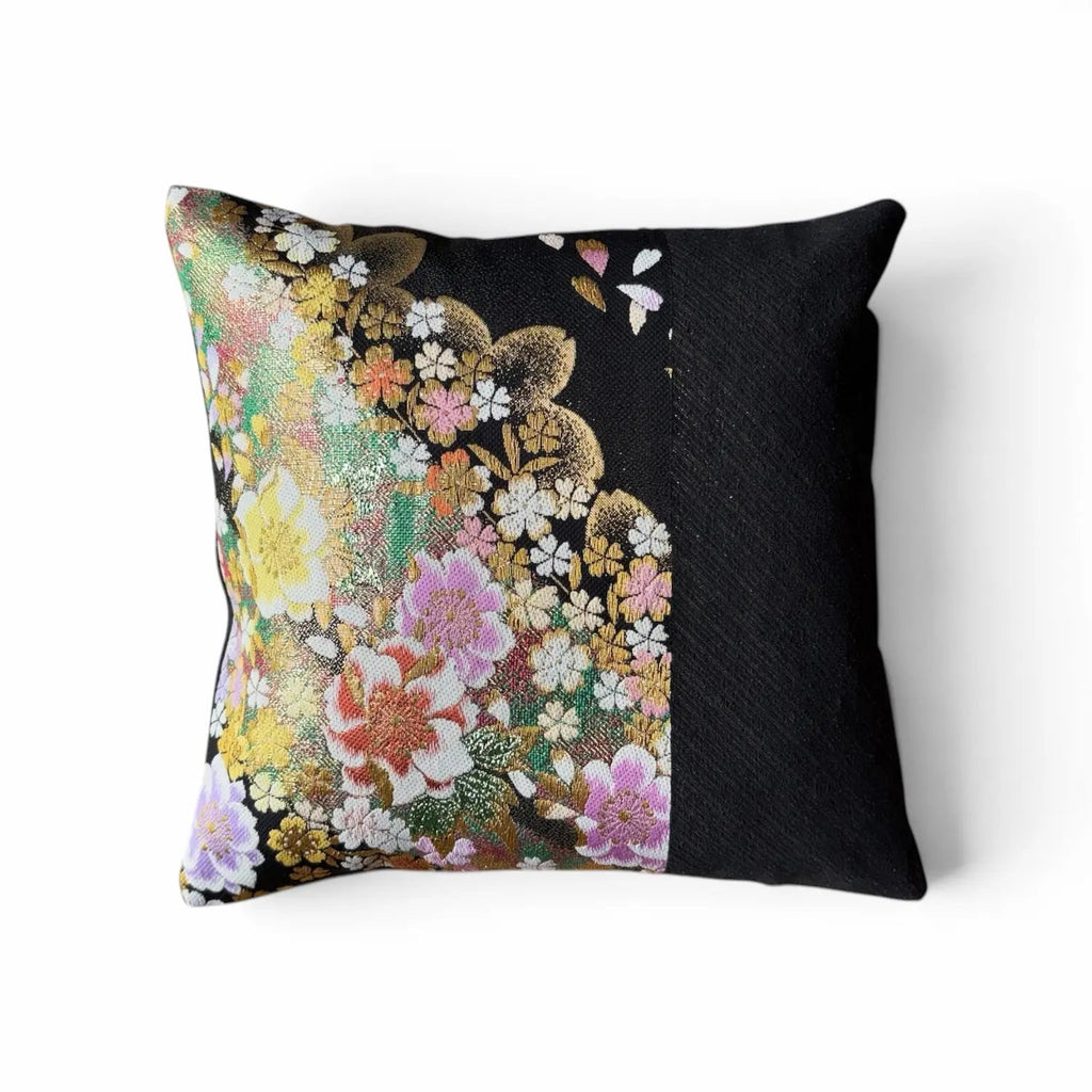 Decorative cushion with floral pattern on a white background