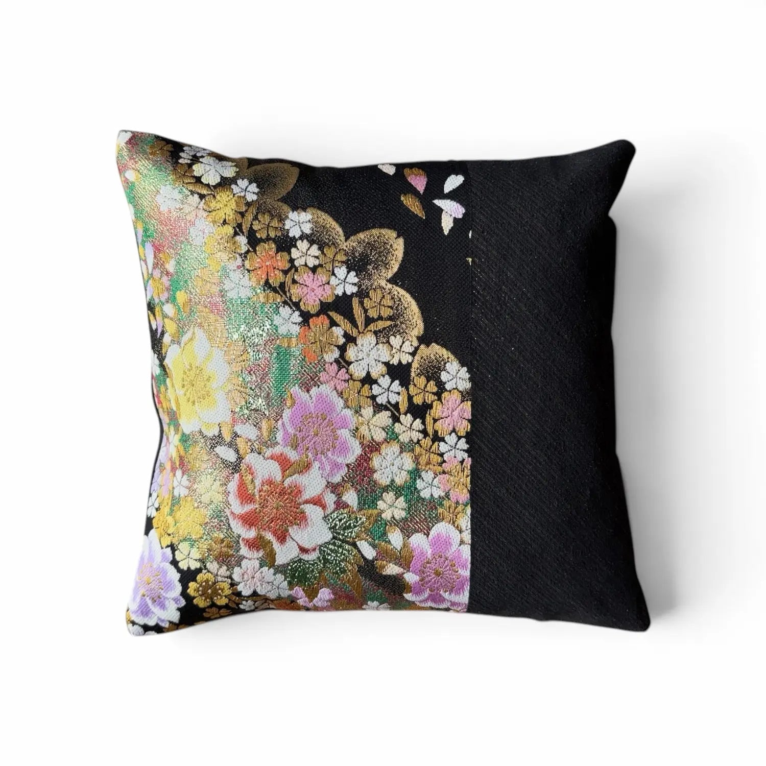 Decorative cushion with floral pattern on a white background