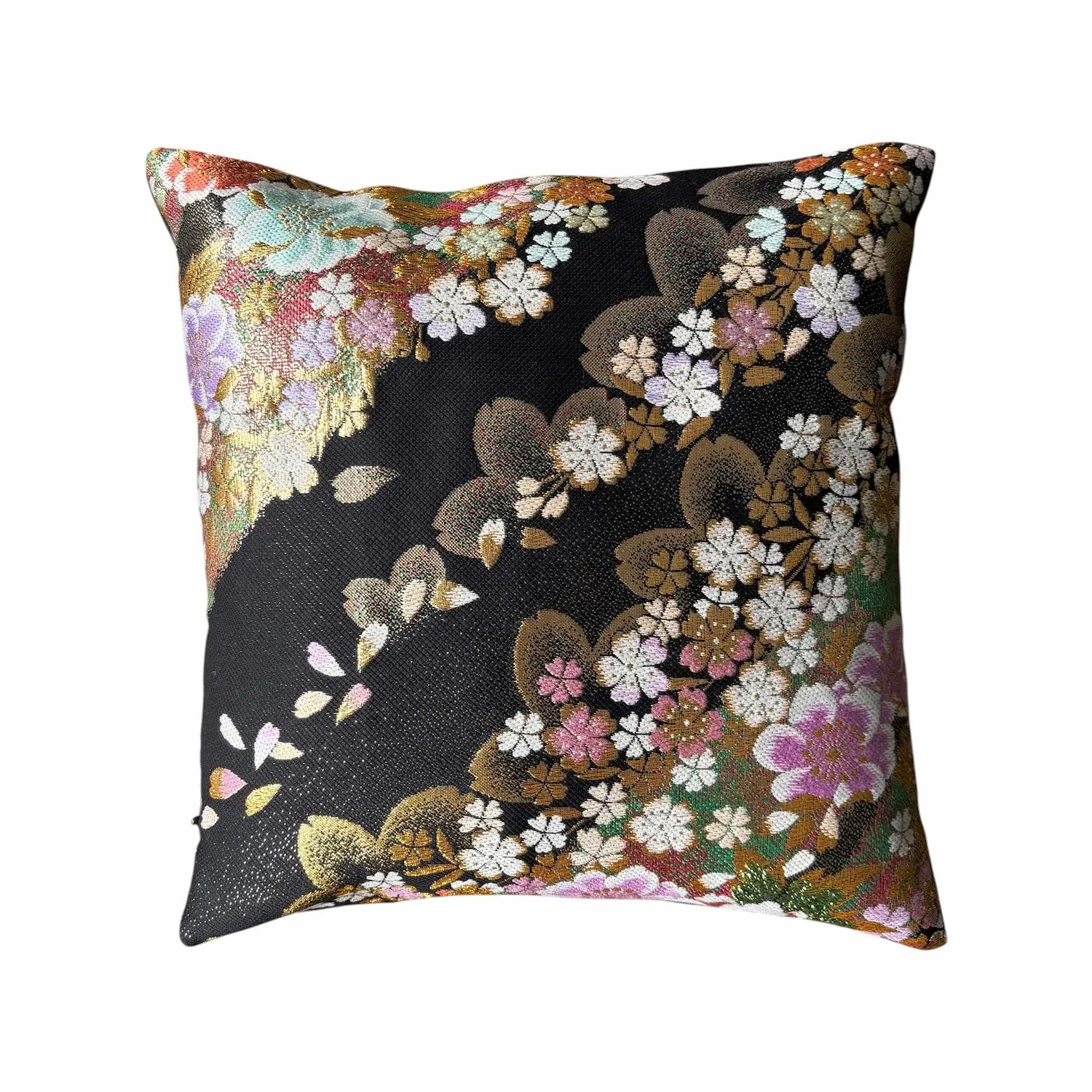 Decorative cushion with floral pattern on a black background