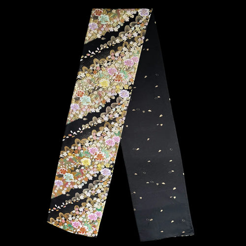 Floral patterned runner on a black background