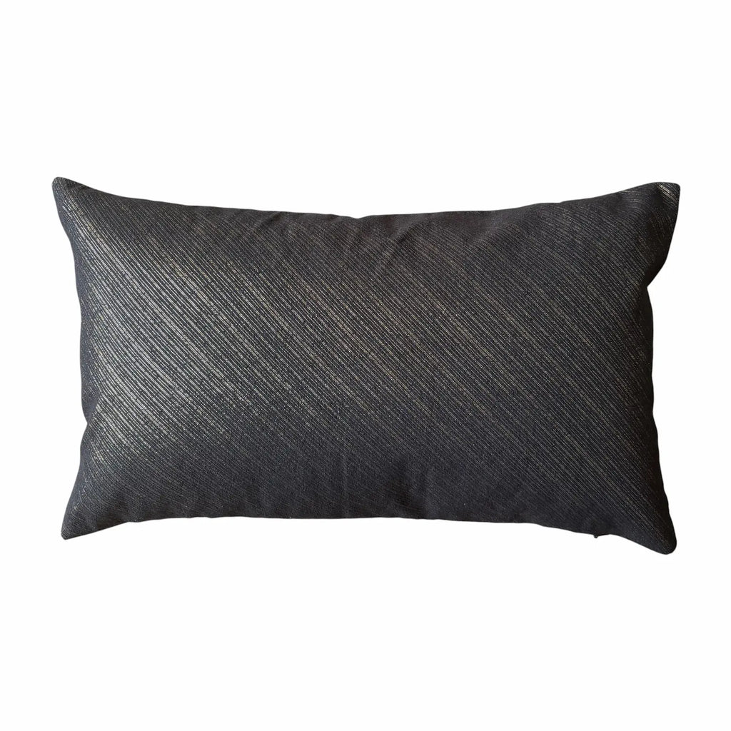 Dark textured pillow on a white background