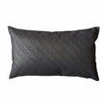 Dark textured pillow on a white background