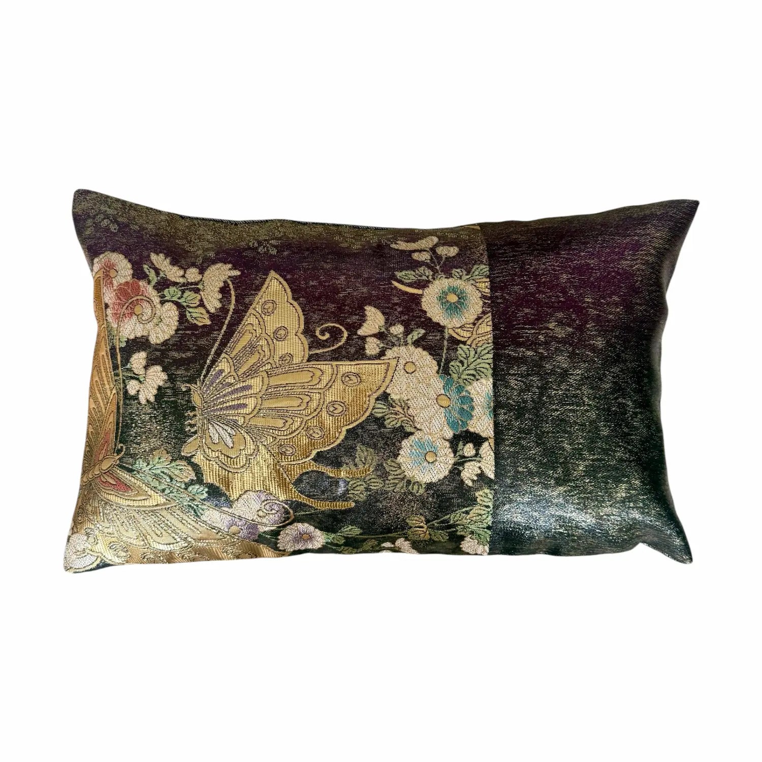 Decorative cushion with butterfly and floral design on a dark background