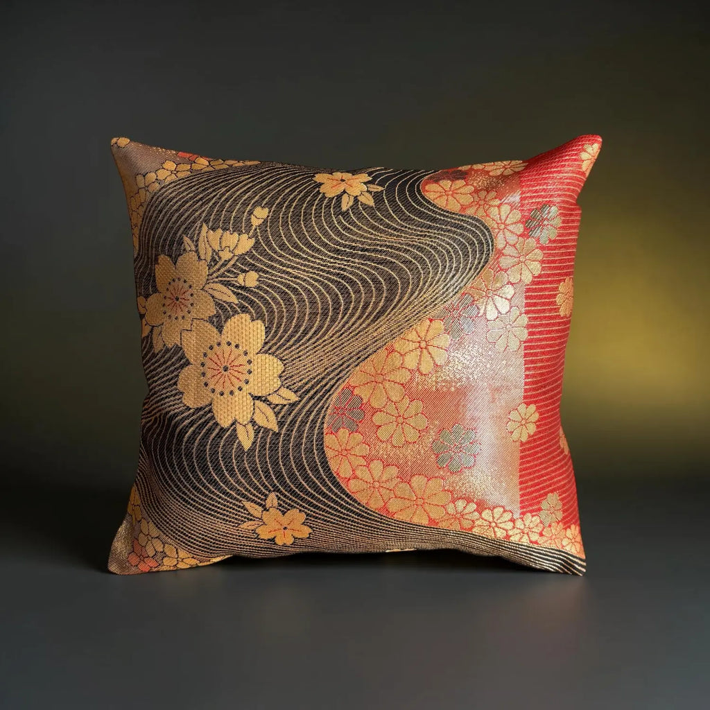 Decorative cushion with floral patterns on a dark background