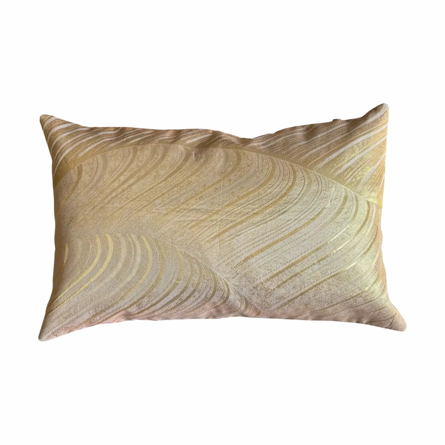 Decorative cushion with wavy pattern on a white background