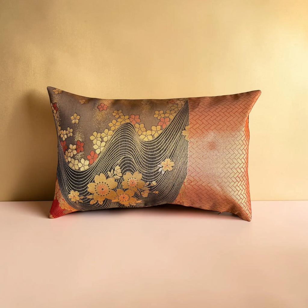 Decorative cushion with floral and geometric patterns on a gold background