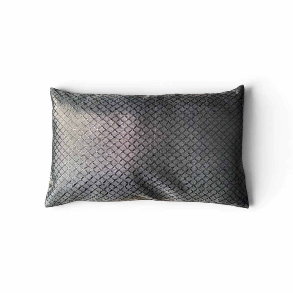 Textured rectangular pillow on a white background