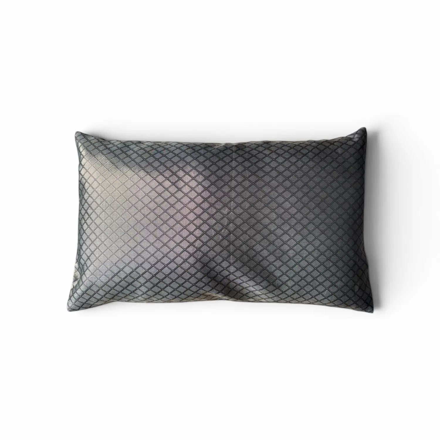 Textured rectangular pillow on a white background