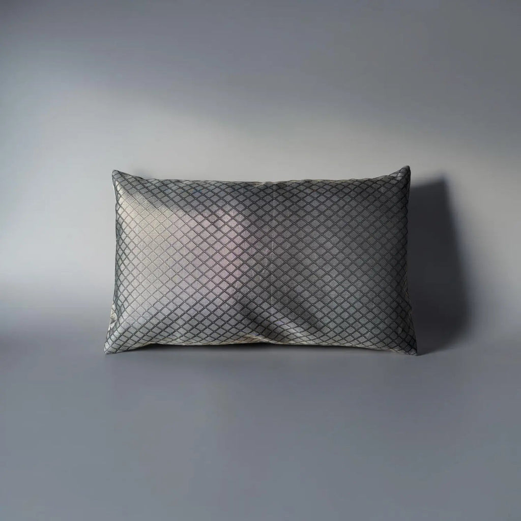 Textured pillow on a gray background