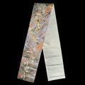 Decorative runner strip with intricate patterns on a black background