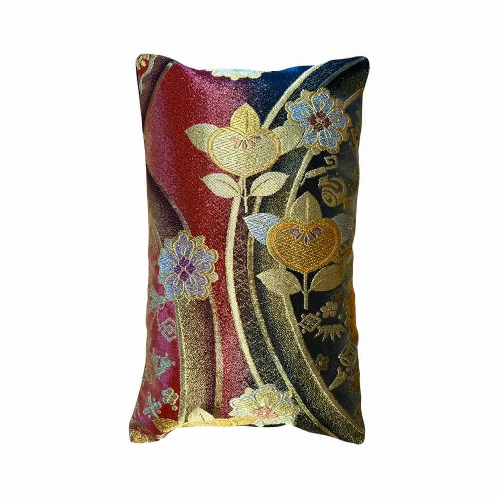 Decorative cushion with floral patterns on a white background