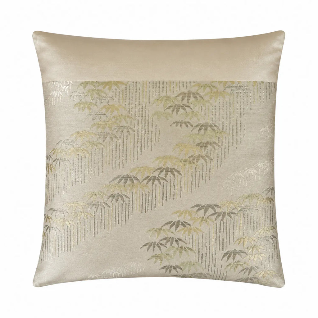 Decorative cushion with bamboo pattern on a beige background