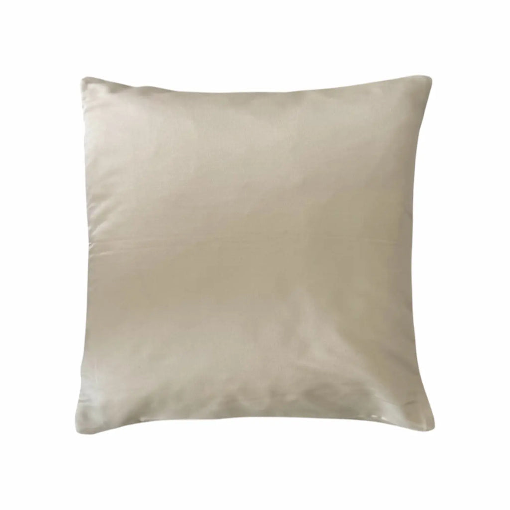 Plain cushion in beige on a white background