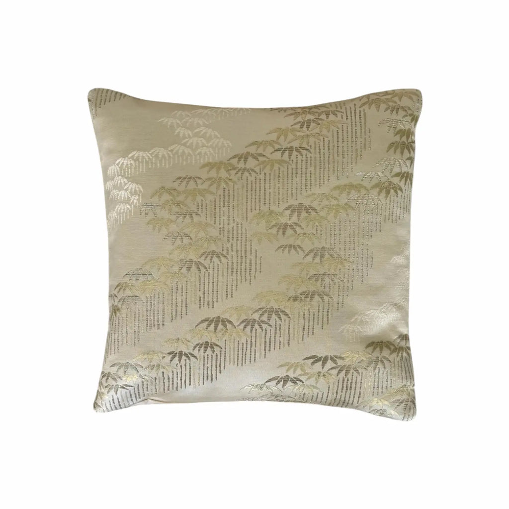 Decorative cushion with a bamboo pattern on a beige background