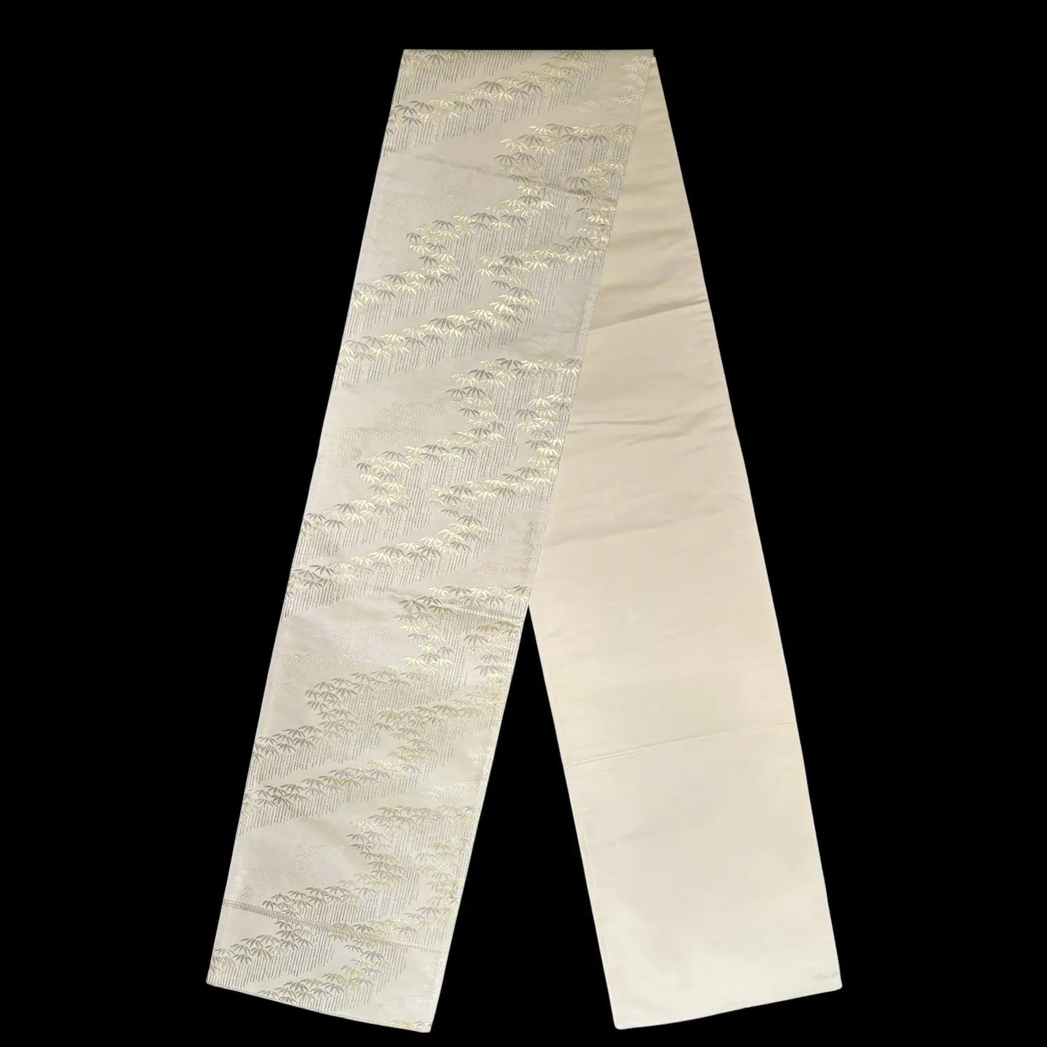 Gold runner with textural pattern on a black background