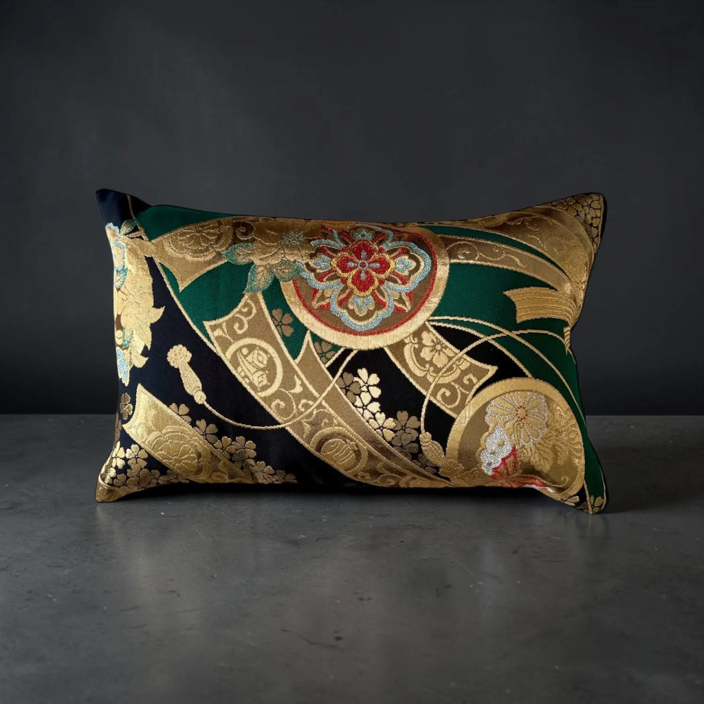 Decorative cushion with intricate patterns on a dark background