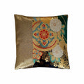 Decorative cushion with floral patterns and gold accents on a white background