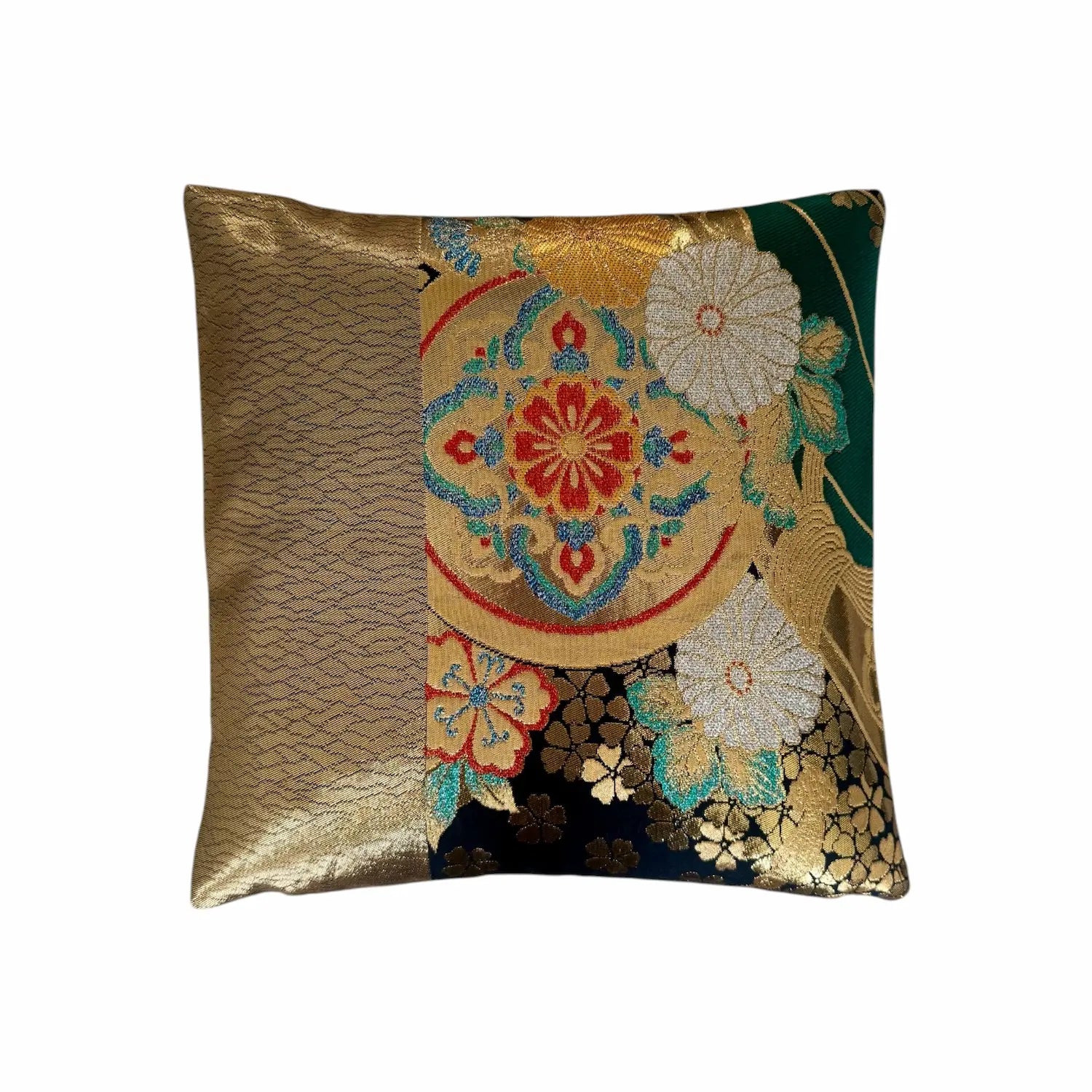 Decorative cushion with floral patterns and gold accents on a white background