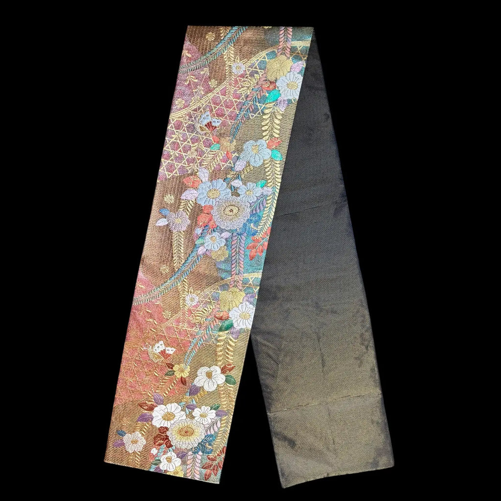 Decorative runner strip with floral patterns on a black background