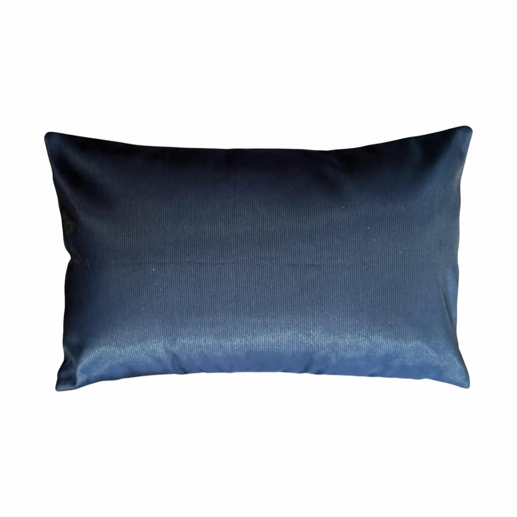 Black satin cushion on a white background