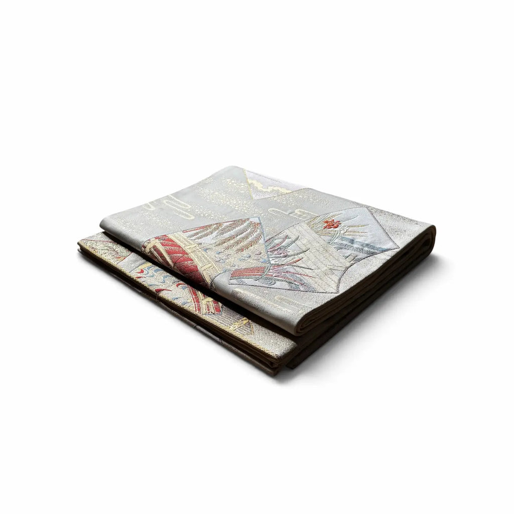 A Kimono Obi, featuring an intricate vintage-style illustration of sailing ships on a light gray background with dark brown edges.