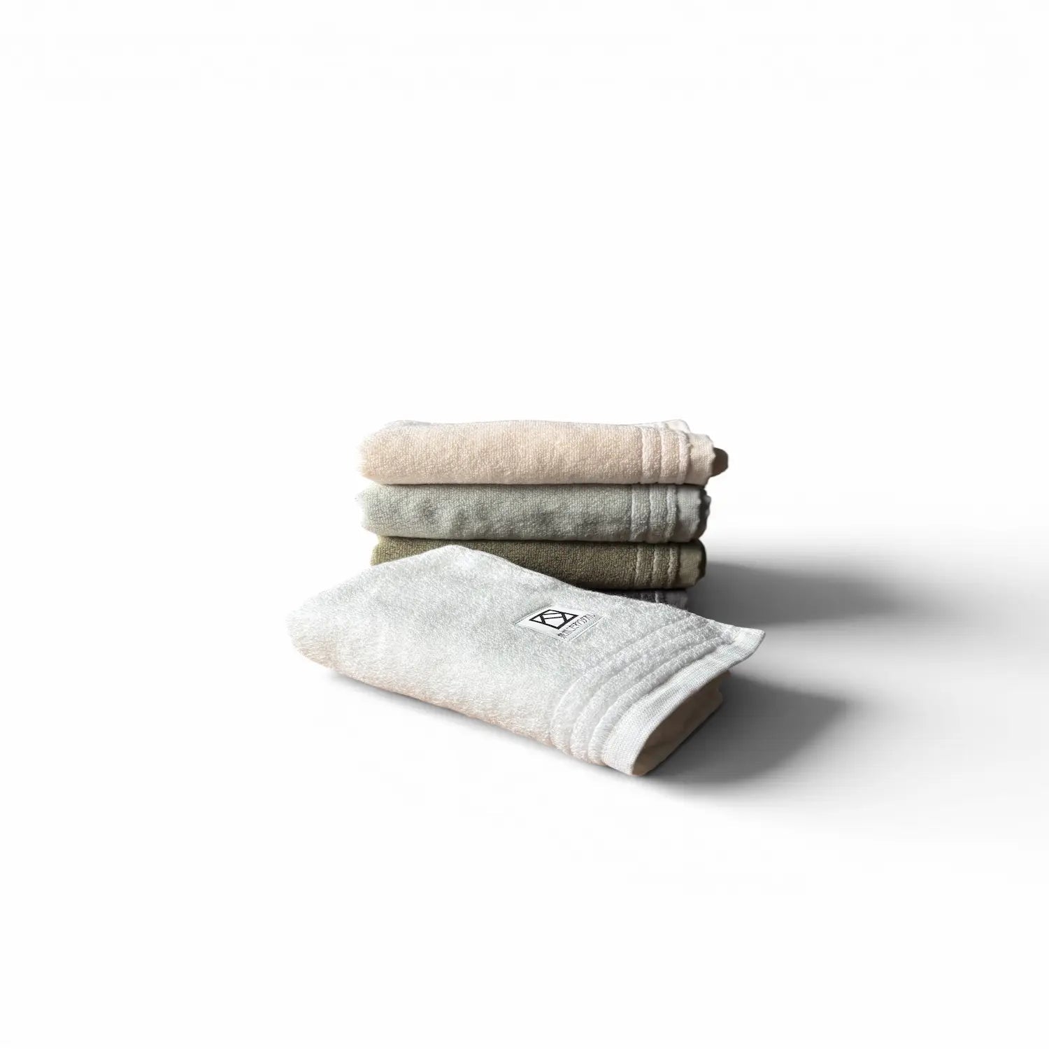Stack of folded Senshu hand towels Sawa on a white background