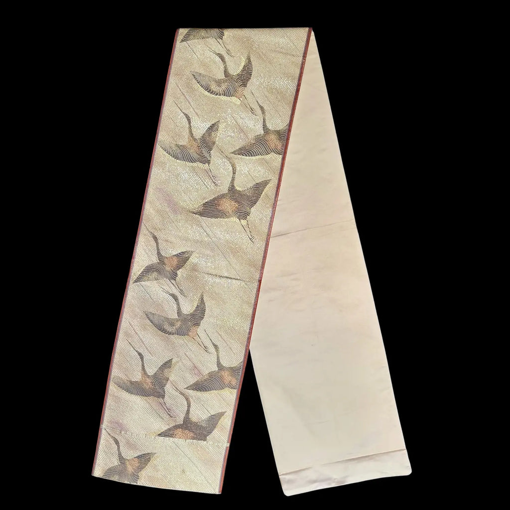 Runner with crane pattern on a plain background