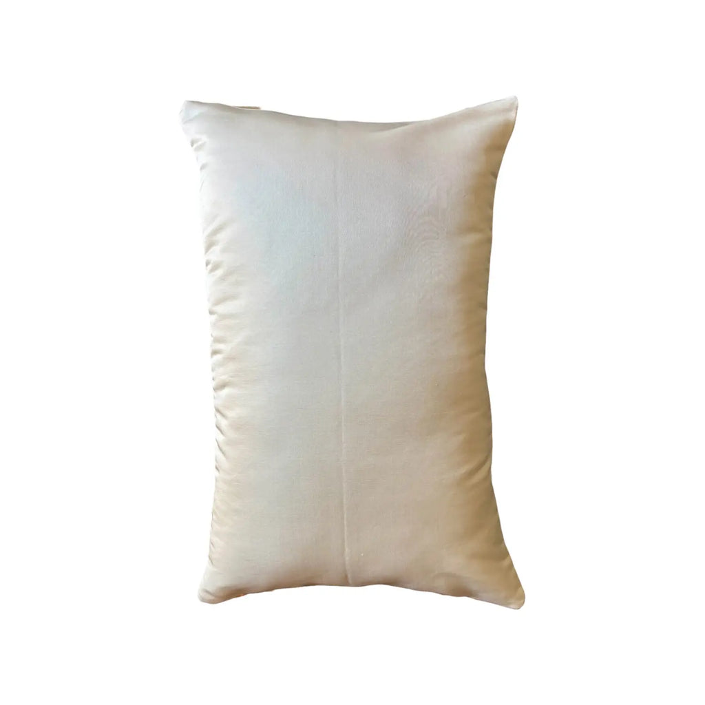 A rectangular cream-coloured cushion, shown against a plain white background.