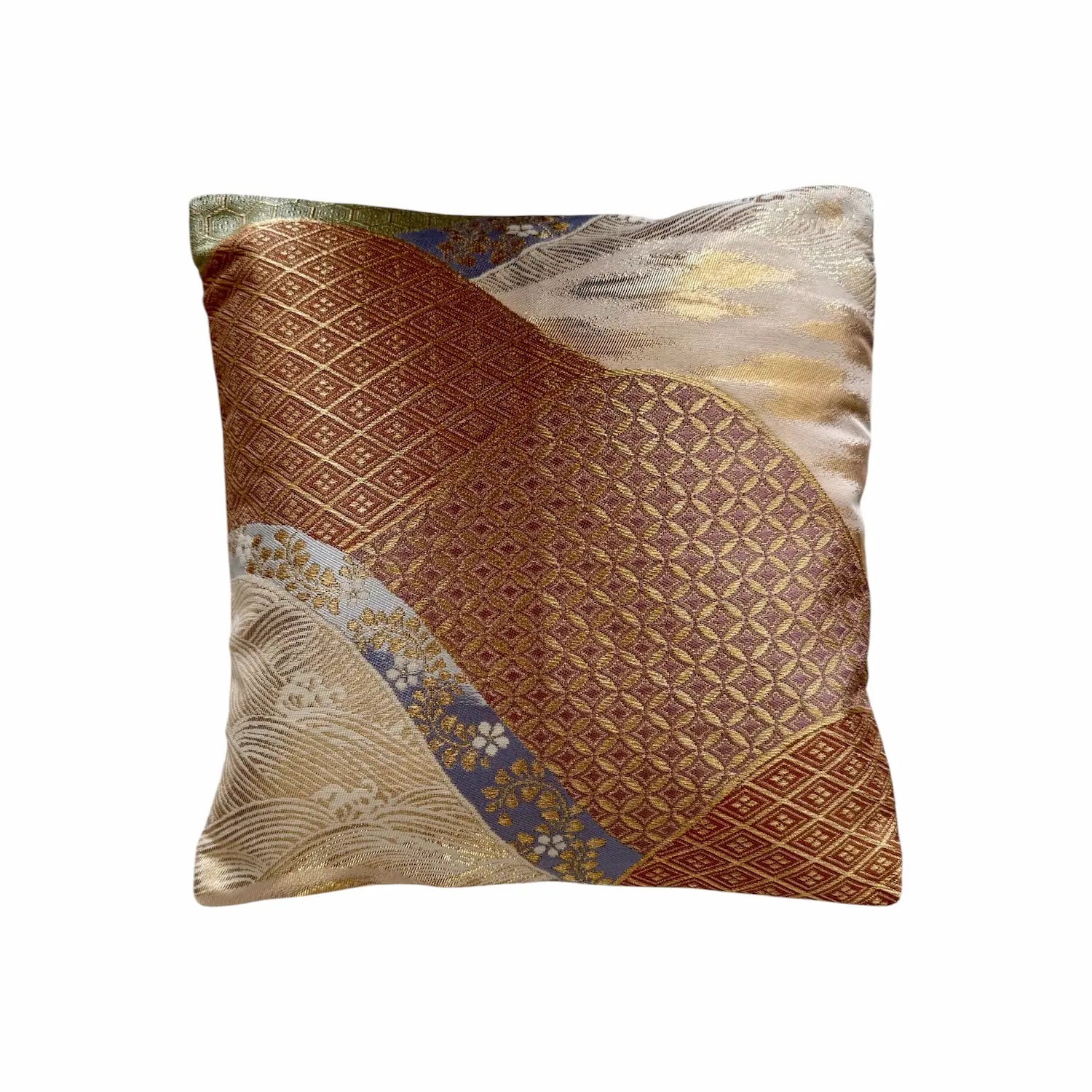 Decorative cushion with intricate patterns on a white background