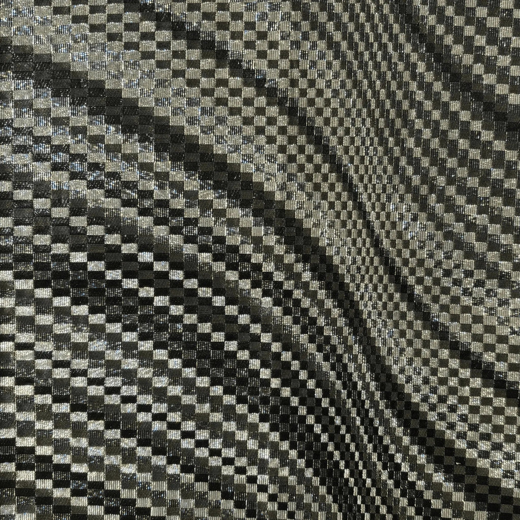 Checkered fabric pattern with black and silver squares
