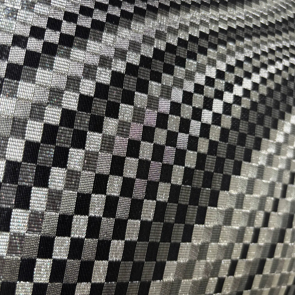 Close-up of a checkered pattern with black and gray squares