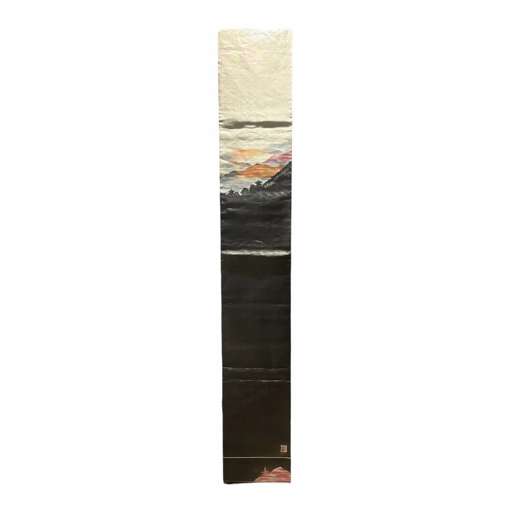 Silk runner with nature-themed design on a white background