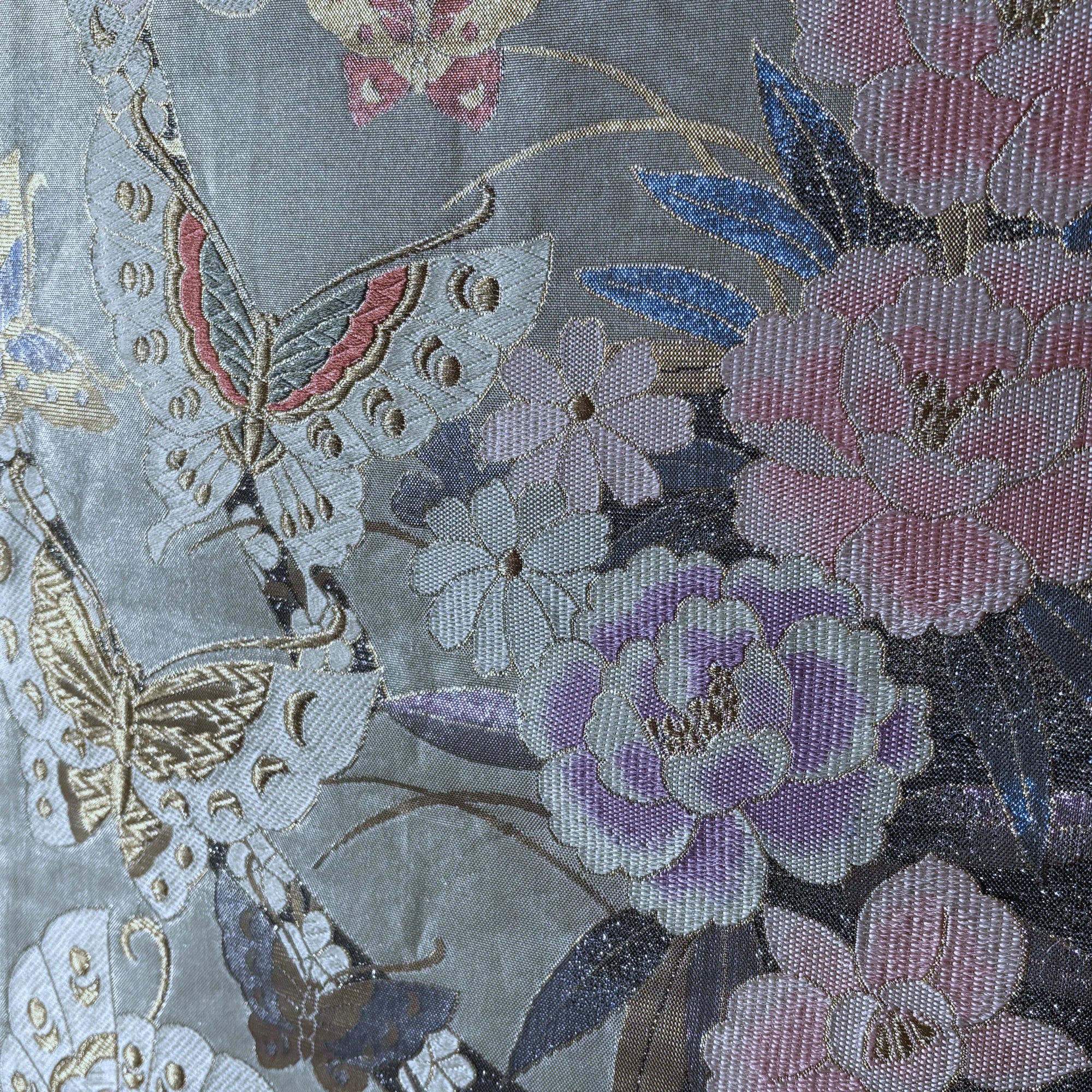 Close-up of floral and butterfly pattern on fabric