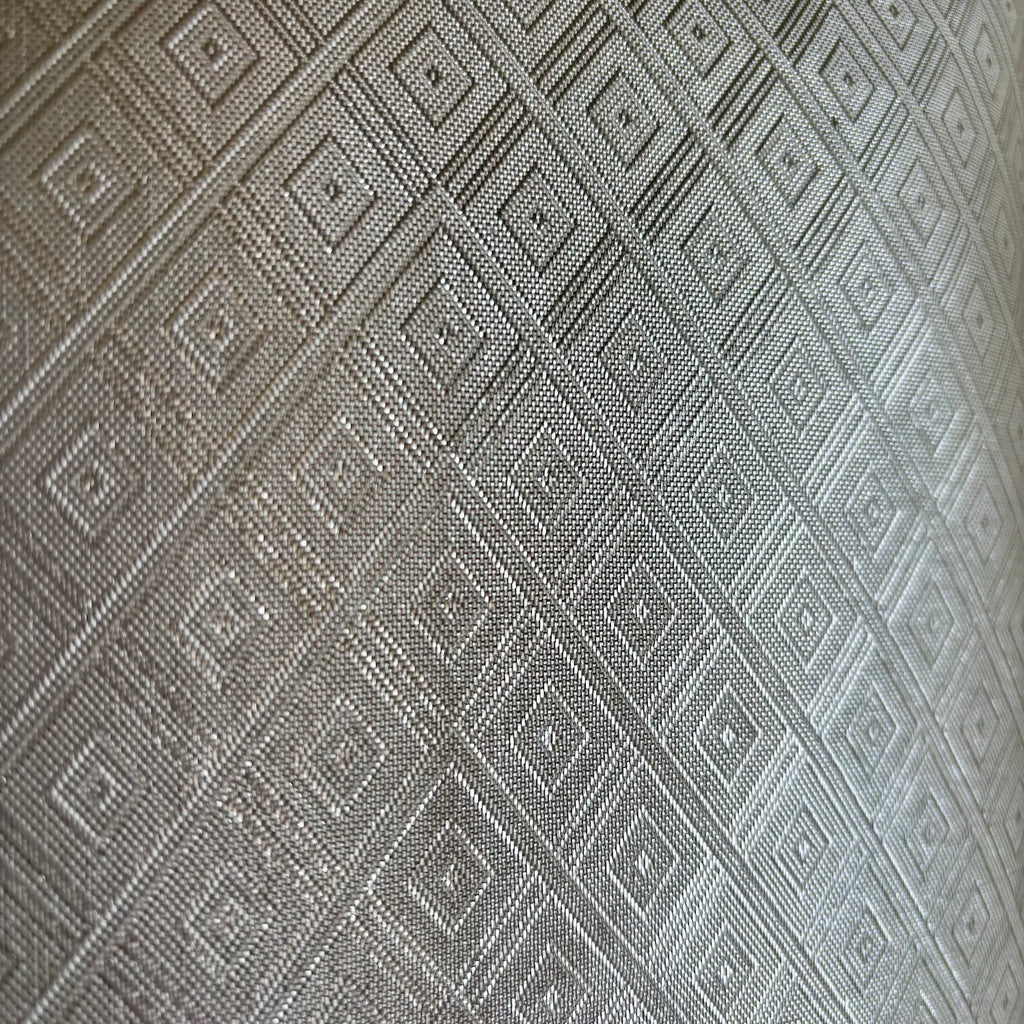 Cream textured diamond patterned fabric